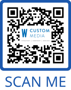 An example of QR codes, with the WCM logo in the middle, with the words scan me below it